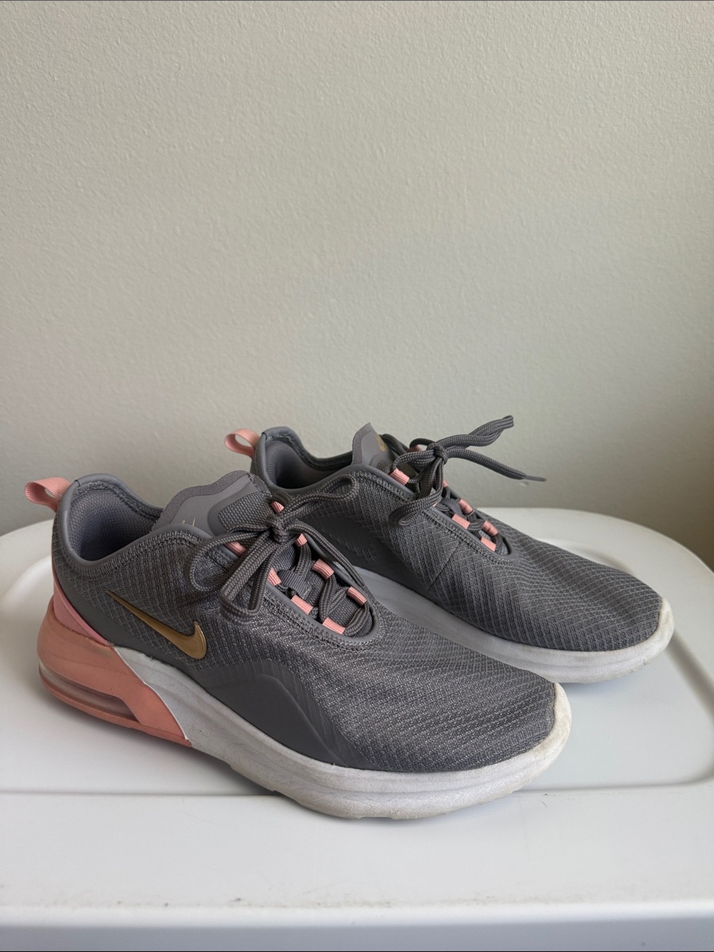 Nike Women's Gray Sneakers with Peach and Gold Accents